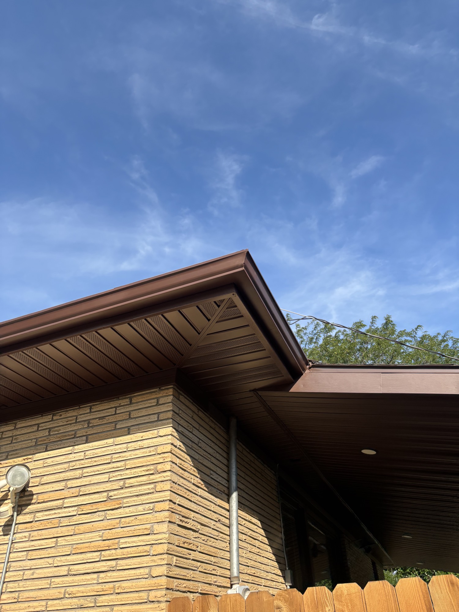 Gutters, soffit and fascia on brick house